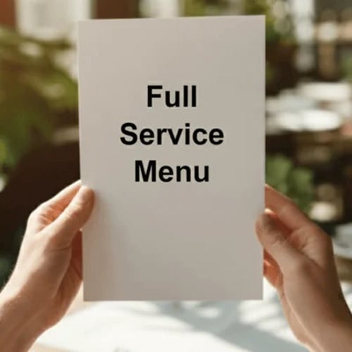 White menu card held by two hands, displaying 'Full Service Menu'.
